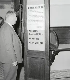 William Horsey Reading Poster About La Prensa Shutdown