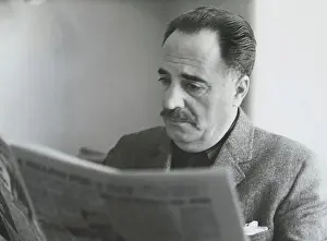 William Saroyan Reading Newspaper