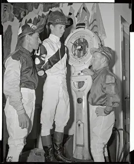Willie Hartach Being Observed While He is Weighed