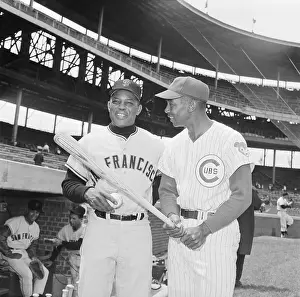 Willie Mays and Ernie Banks Posing with Baseball Bat