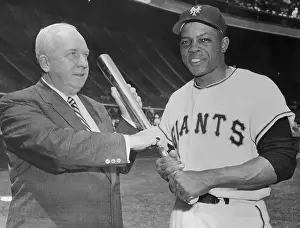Willie Mays Posing with Warren Giles and Holding Awarded Bat