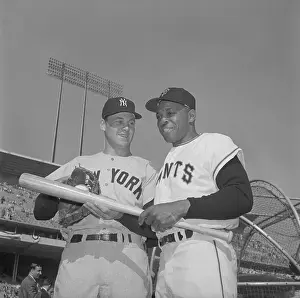 Willie Mays and Tom Tresh Examining Baseball Bats