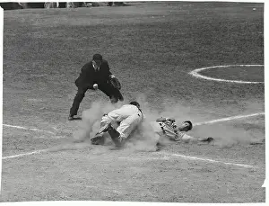 Willie Miranda Sliding Into Home Plate