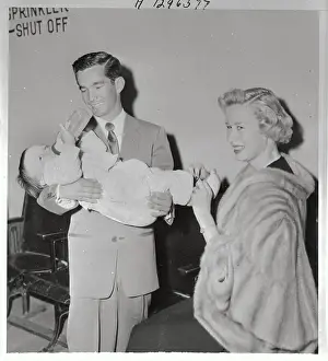 Fatherhood Prints: Willie Shoemaker and Wife Holding Adopted Son