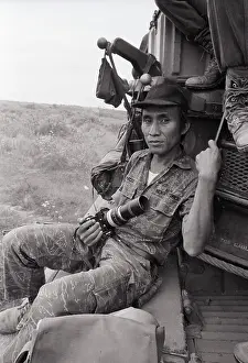 Willie Vicoy Leaning Against Truck