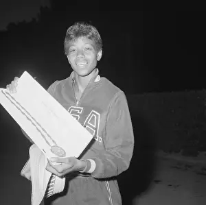 Wilma Rudolph Holding Olympic Gold Medal
