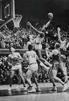 Wilt Chamberlain Jumping for Basket