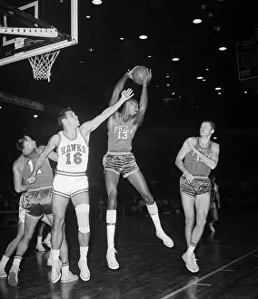 Wilt Chamberlain Jumping for Rebound