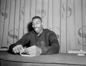 Wilt Chamberlain Seated at Table