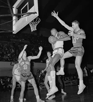 Wilt Chamberlain Stealing Ball from Dave Budd