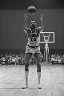 Wilt Chamberlain Tossing Basketball