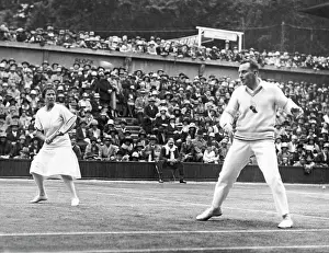 Prints of Americans Elizabeth Ryan and Frank Hunter playing against the British team in the Lawn Tennis Championships at Wimbledon, London, England, 1927. They won the mixed doubles championship The Grand Slam Gallery: Wimbledon Championship Play