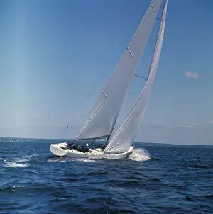 Windblown Sails of Yacht on Open Sea