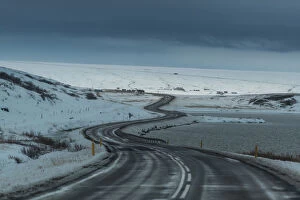 Images Dated 31st October 2013: Winding road through Iceland winter landscape