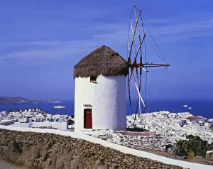 Traditional Windmills Gallery: Windmill and View of Mykonos by the Coast, Cyclades, Greece