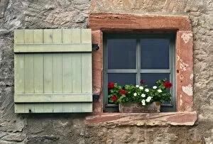 Images Dated 22nd August 2011: Window with shutters and geraniums, Eberbach, Hesse, Germany, Europe