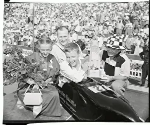 Akron Prints: Winner of Soap Box Derby Receiving Trophy