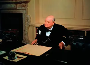 Winston Churchill Sitting at his Desk