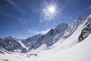 Images Dated 10th March 2013: Winter landscape with sun toward the Steintalspitze summit, Stubai Alps, Tyrol, Austria