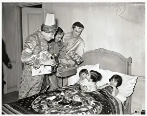 Three Wise Men Giving Children Gifts