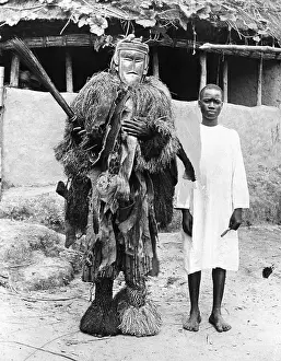 Mask Prints: Witch Doctor/Wood Mask Stands With Man