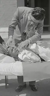 Wolf Boy Being Cared for by Doctor