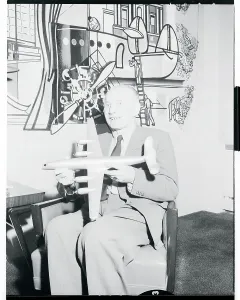 Lufthansa Prints: Wolfgang von Gronau Holding Model Airplane