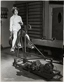Mechanical Prints: Womam Seated On Mechanical Bull