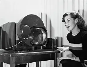 Video Prints: Woman Adjusting Color Tv