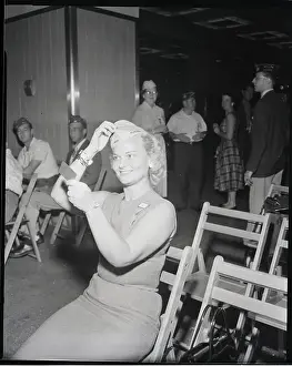 Convention Prints: Woman Adjusts Veteran'S Hat