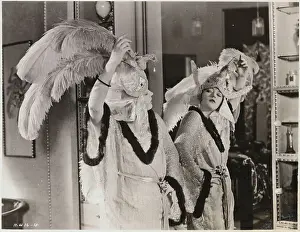 Similarity Prints: Woman Admiring Her Headdress