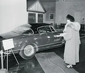Dearborn Prints: Woman Admiring a New Ferrari