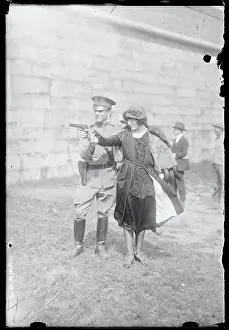Woman Aiming a Gun