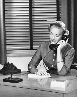 Using Phone Prints: Woman answering phone