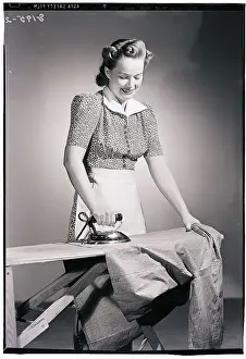Photographers Model Prints: Woman in Apron Ironing