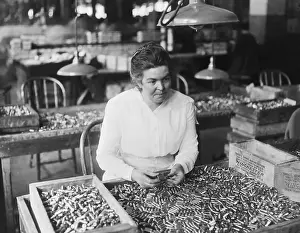 Slug Prints: Woman Assembling Cartridges