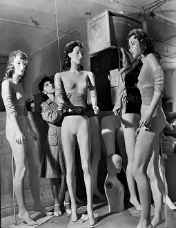 Woman Assembling Mannequins