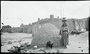 Woman Balancing Water Pot on Head