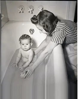 Everyday Scene Prints: Woman Bathing Infant in Tub