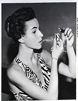 Woman In Bathing Suit Smoking Pipe