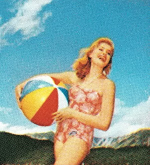 Images Dated 2nd April 2015: Woman with beach ball