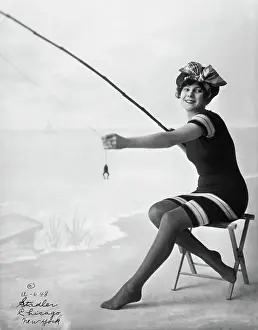 Woman on Beach with Frog on Fishing Pole