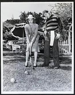 Croquet Prints: Woman Beating Man in a Game of Croquet