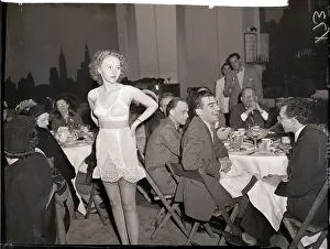 Slip Prints: Woman in Bra and Slip Amongst Diners