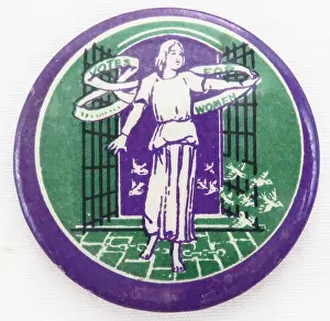 Prints of Badge depicting a woman in white emerging from prison after having broken her chains, designed by women's suffrage advocate Sylvia Pankhurst, 1910. Photography by Emilia van Beugen Historic Moments from the Women’s Fight for the Vote: Woman Breaking Chains