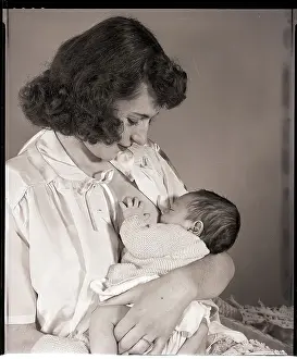 Woman Breast-Feeding Baby
