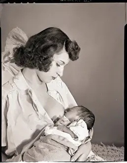 Woman Breast-Feeding Baby