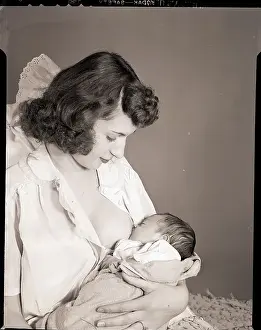 Woman Breast Feeding Her Baby
