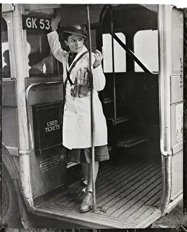 Woman Bus Conductor Beckons To Passengers 1941