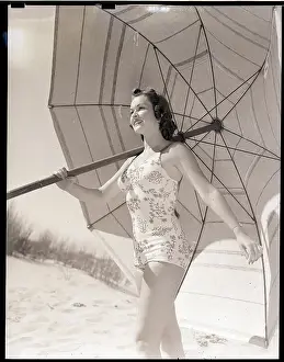 Woman Carrying Huge Umbrella